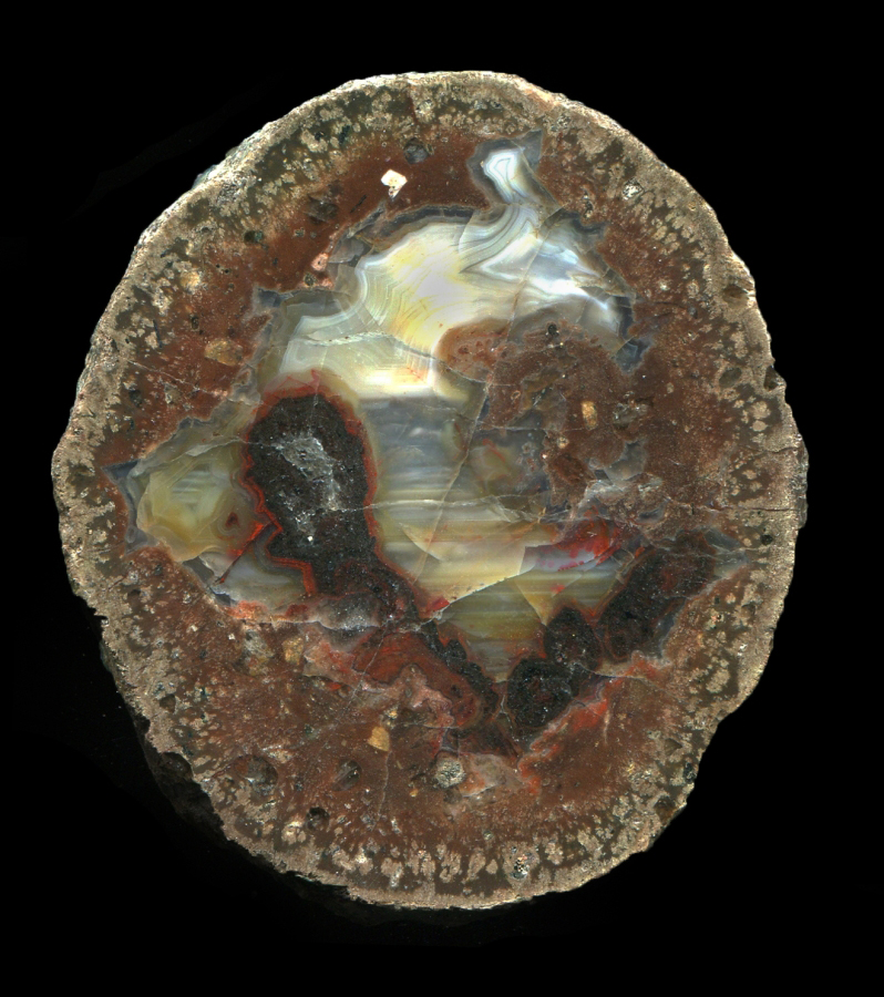 Elegant Köpfchen with Black and Red Pseudomorphs